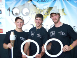 left to right: Bob Evans, Ben Bachran, Jason Cattelino on unicycles